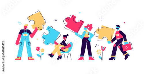 People connecting puzzle elements