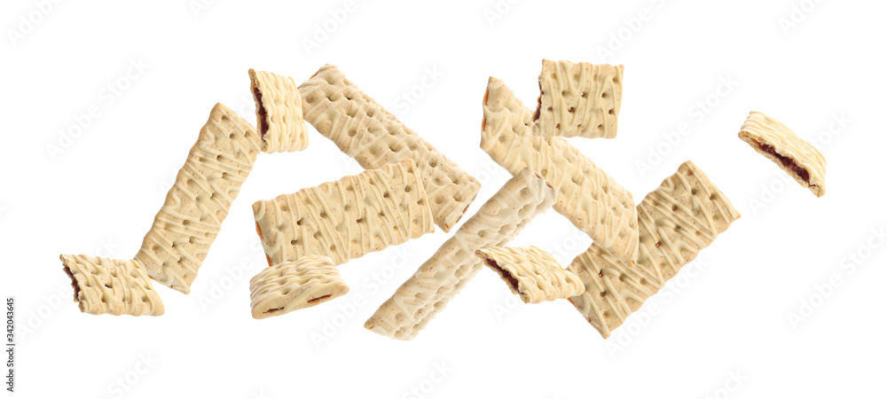 Set of falling delicious cookies with filling on white background. Banner design Set of falling delicious cookies with filling on white background. Banner design