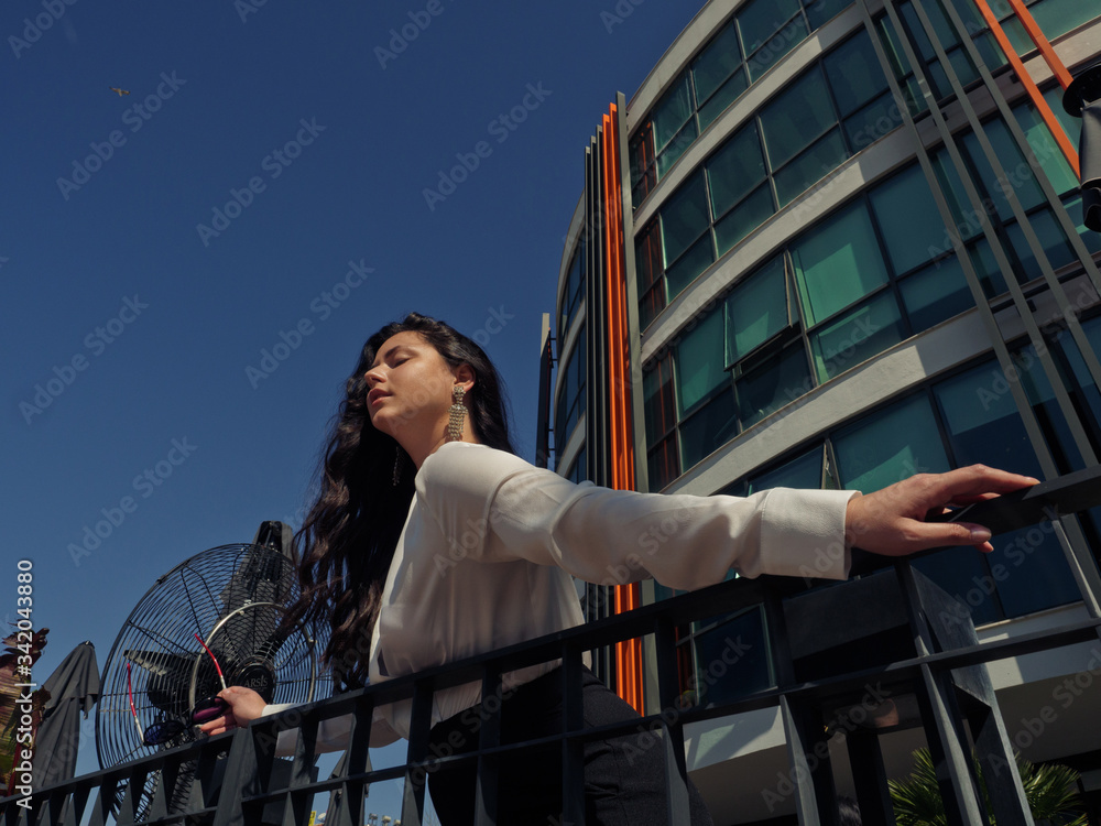 Woman standing in front of a building