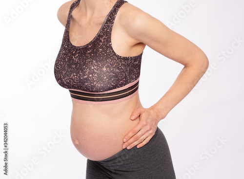 Pregnant woman has lower back discomfort