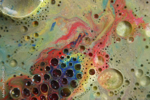 Abstract liquid ink marble color waves and bubbles