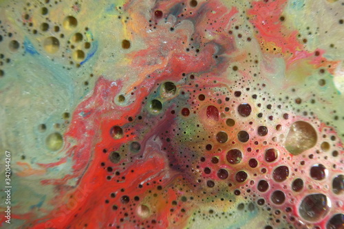 Abstract liquid ink marble color waves and bubbles