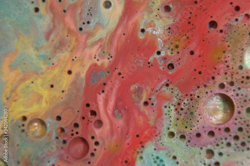 Abstract liquid ink marble color waves and bubbles