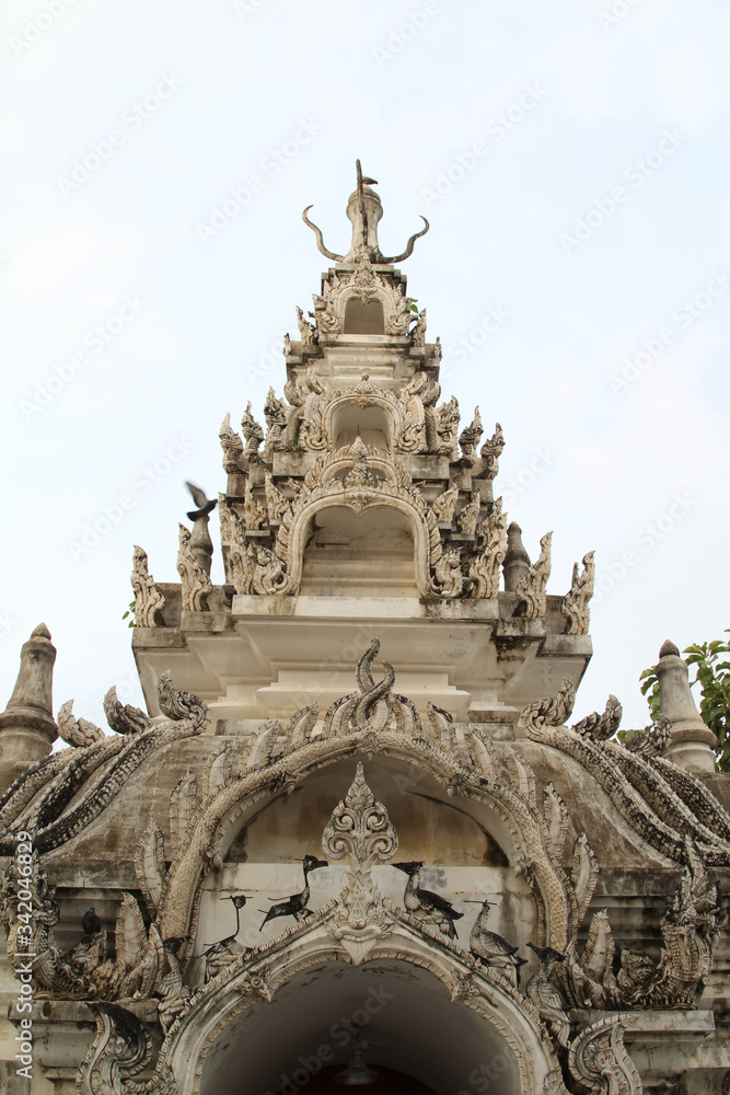 The chedi in Wat Phra That Chohae in Phrae province, Northern Thailand. The chedi in Wat Phra That Chohae in Phrae province, Northern Thailand.