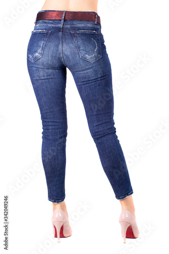 Woman in blue jeans. Fit female butt in blue jeans. Isolated on white