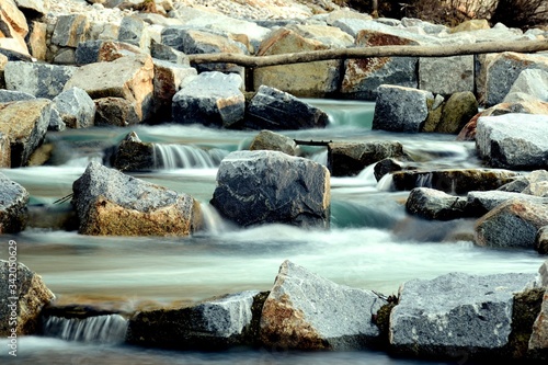 Small soft waterfalls of a fish bridge
