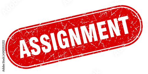 assignment sign. assignment grunge red stamp. Label