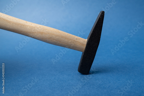 hammer with wooden handle close-up