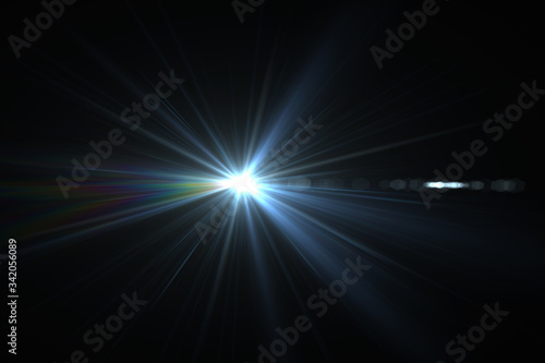 Bright beam of a searchlight on a dark background. Light from a lamp in the dark.Flash