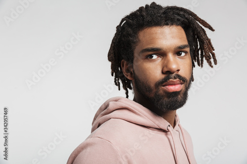 Fototapeta Naklejka Na Ścianę i Meble -  Portrait of a young african man wearing hoodie