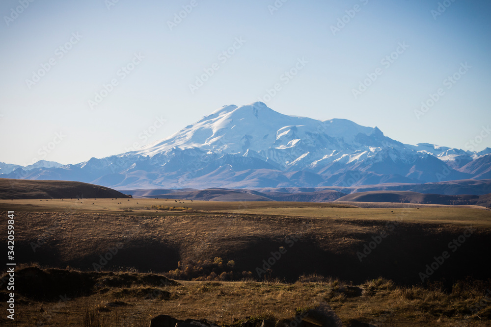 Mount Elbrus, the highest mountain in Russia. North Caucasus. Sunset overlooking Elbrus, beautiful nature, mountains.