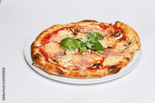 A slice of pizza on a plate