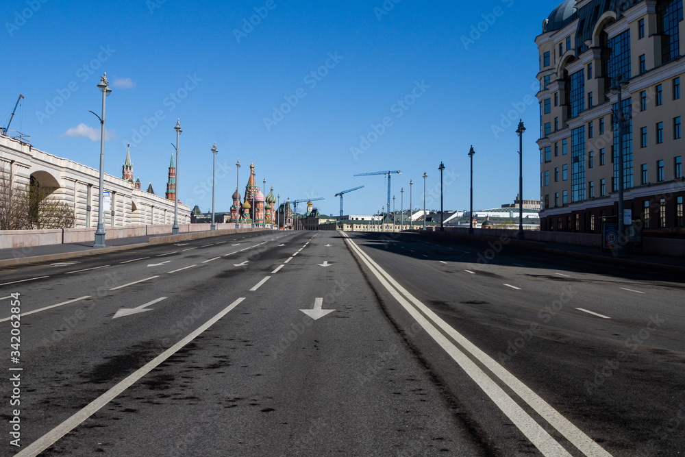 Covid-19, quarantine in Moscow, coronavirus in Russia. Kremlin. Empty streets without people. Self-quarantine in deserted city due to Covid-19 virus pandemic. Big Moskvoretskiy Bridge, April, 2020