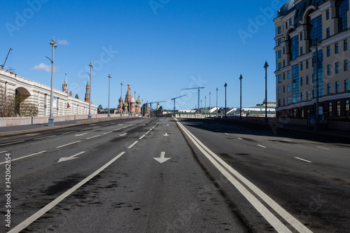 Covid-19  quarantine in Moscow  coronavirus in Russia. Kremlin. Empty streets without people. Self-quarantine in deserted city due to Covid-19 virus pandemic. Big Moskvoretskiy Bridge  April  2020