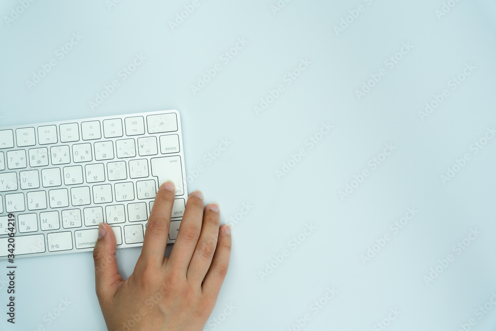 Using a computer on a white background Using a computer on a white background