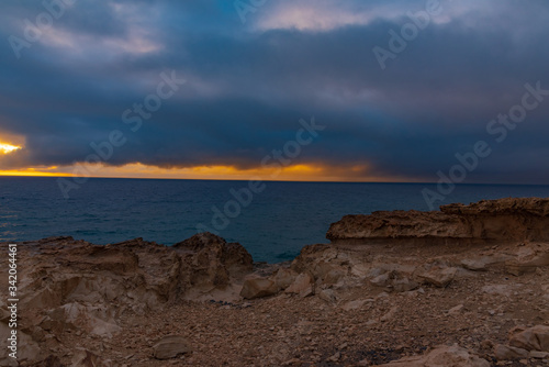 ocean sunset on the cliff © DD25