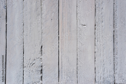 freshly painted white wooden fence, light plank wall, textured wooden background