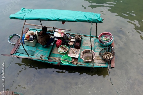 Selling seafood from boat in Vietnam