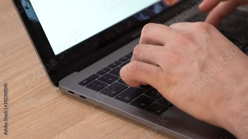 Man Typing On Laptop Keyboard, Close-up