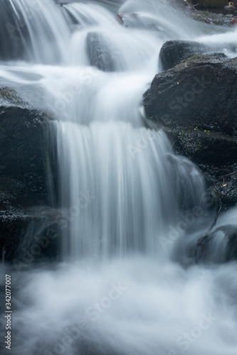 Silky, turbulent water of a small waterfall in Hebron, Connecticut.