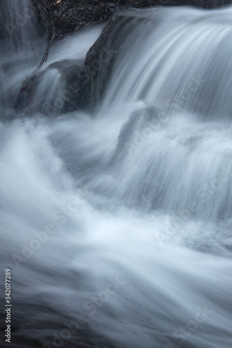 Silky  turbulent water of a small waterfall in Hebron  Connecticut.