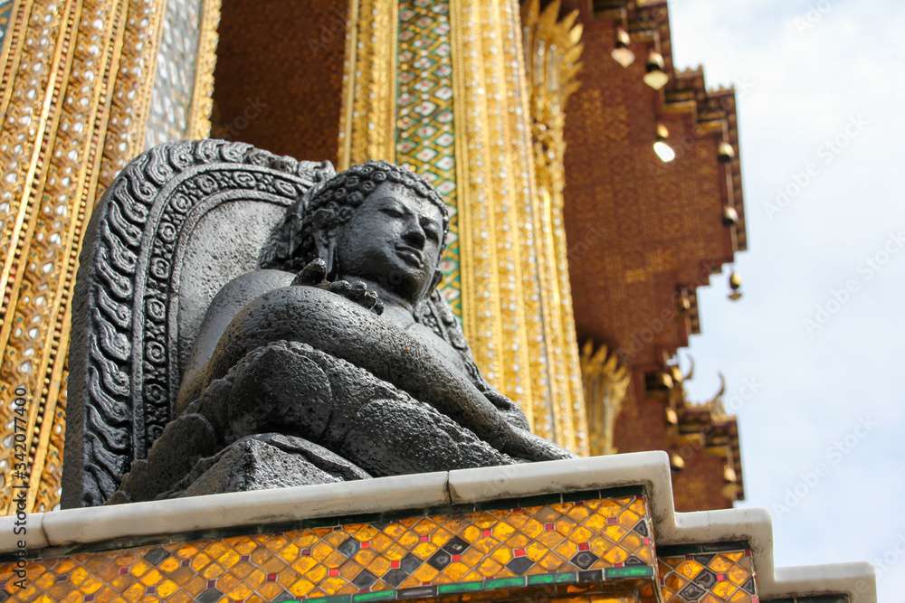 Stone statue in a temple in Thailand Stone statue in a temple in Thailand