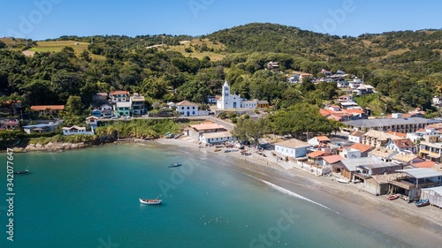 Aerial view of the church and beach of Garopaba, in Santa Catarina, Brazil