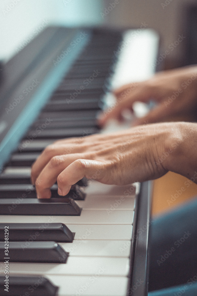 Fototapeta premium Woman and her piano in home