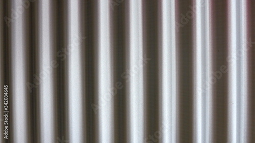 Metallic shiny background, corrugated iron, detailed close-up 