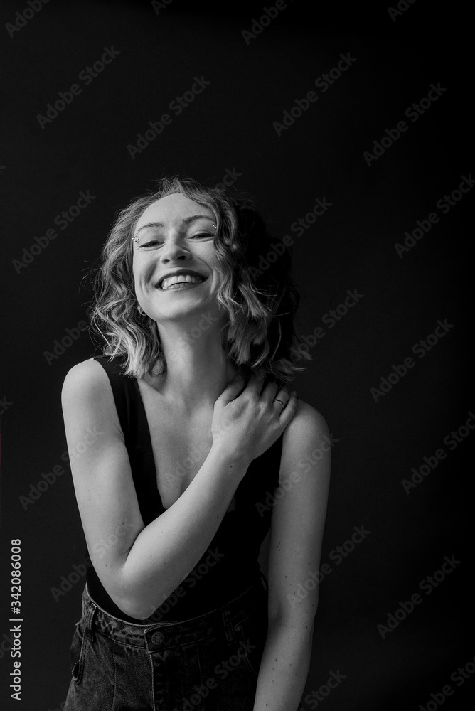 Wide smile happy woman portrait on black Wide smile happy woman portrait on black