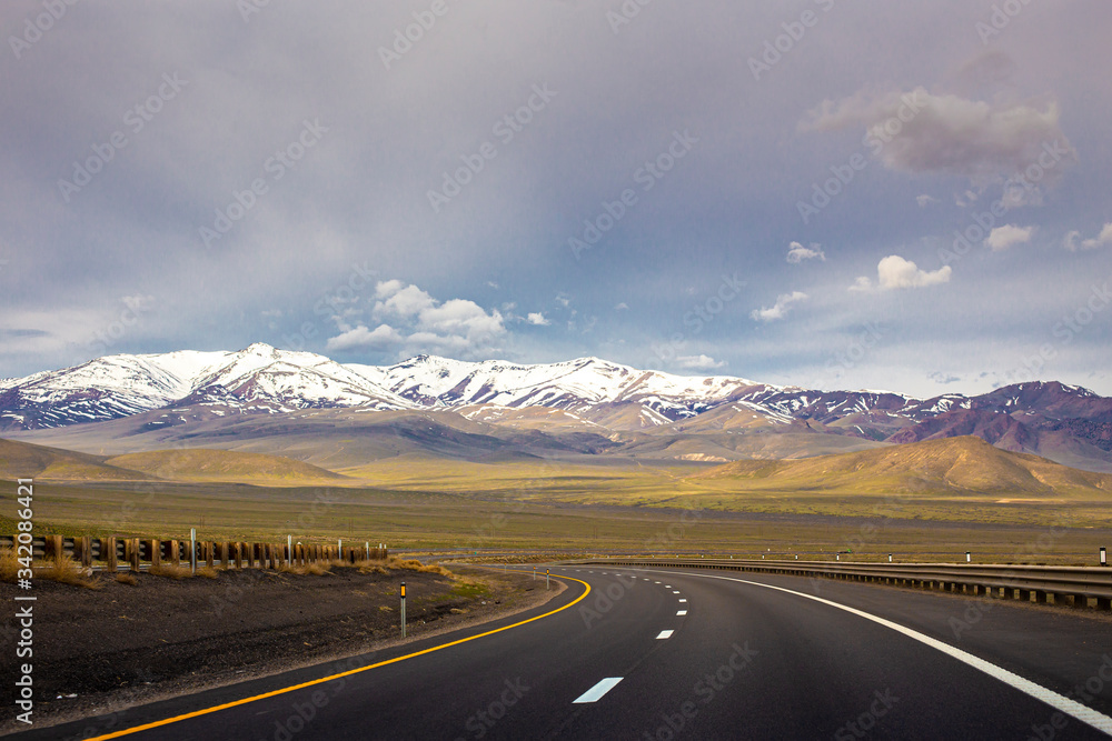 A Lonely Long Road with a Stunning Scenic Landscape View