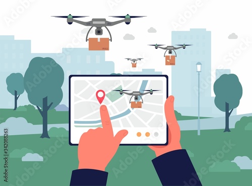Delivery drone remote control app on tablet screen, hands holding device