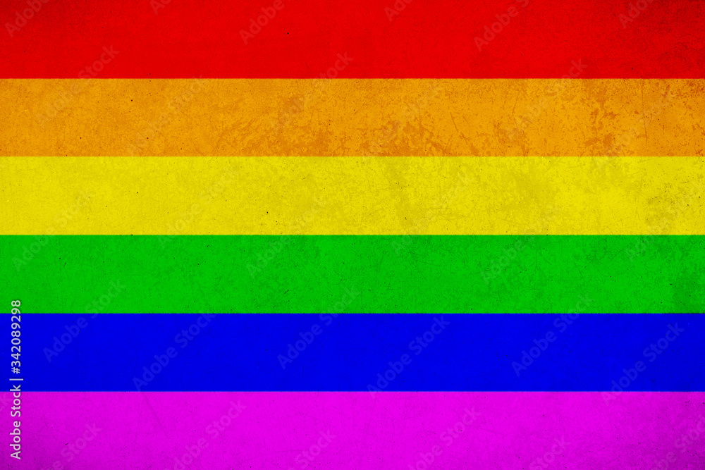 Rainbow flag grunge background, commonly known as the gay pride flag or LGBTQ pride flag Rainbow flag grunge background, commonly known as the gay pride flag or LGBTQ pride flag
