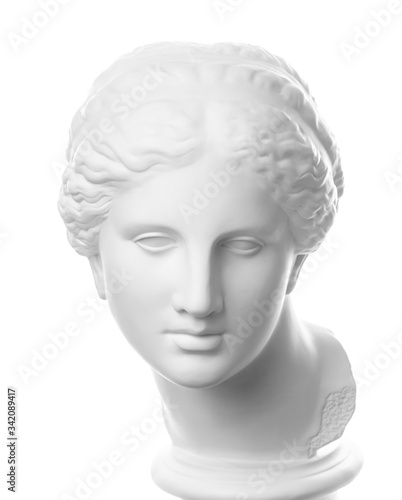 Gypsum copy of ancient statue Venus head isolated on white background. Plaster sculpture woman face. © Ded Pixto