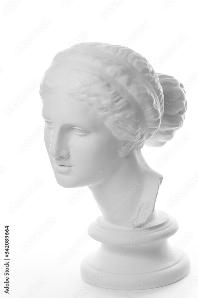 Gypsum copy of ancient statue Venus head isolated on white background. Plaster sculpture woman face. Gypsum copy of ancient statue Venus head isolated on white background. Plaster sculpture woman face.