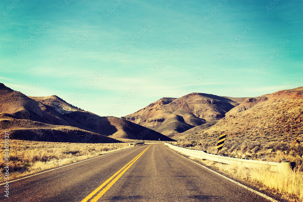 A Lonely Long Road with a Stunning Scenic Landscape View