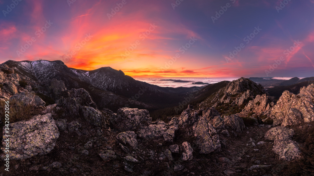 Breathtaking view of mountain ridge located against vivid sundown sky in cloudy evening in nature Breathtaking view of mountain ridge located against vivid sundown sky in cloudy evening in nature