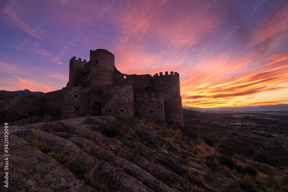 Sightseeing medieval ruined castle against cloudy sundown sky in countryside in Toledo Sightseeing medieval ruined castle against cloudy sundown sky in countryside in Toledo