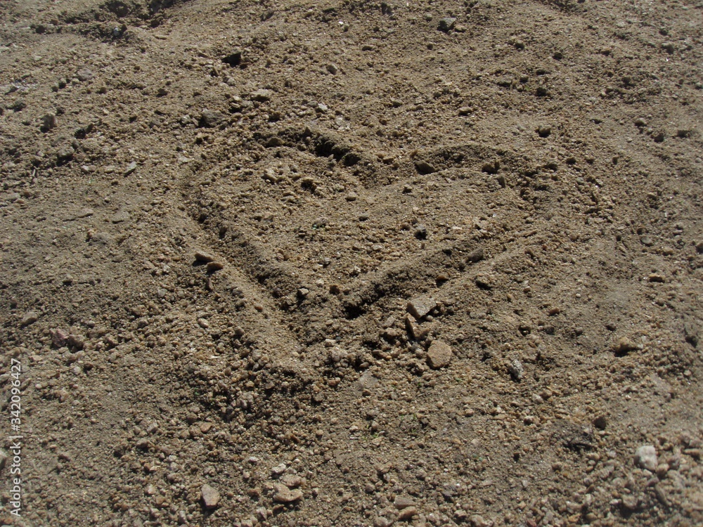 Heart in the sand Heart in the sand