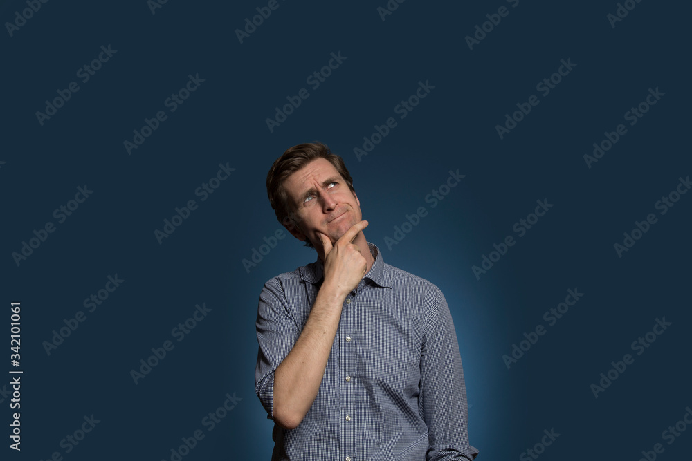 Man with Hand on Chin and Thinking Facial Expression Man with Hand on Chin and Thinking Facial Expression