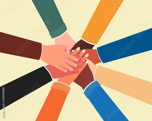 Group of people joining hands together - team unity and diversity poster