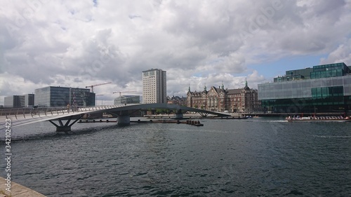 Copenhagen, Denmark. View of the city canal with a foot bridge © Vadim