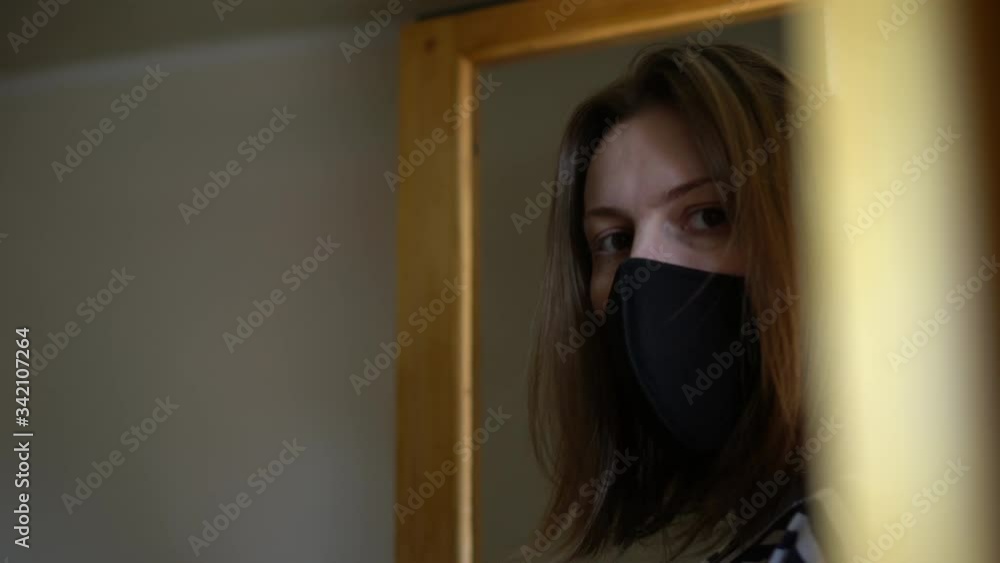 Woman takes off facial mask, it's ended. Covid lockdown finished. Social distancing is over. Woman takes off facial mask, it's ended. Covid lockdown finished. Social distancing is over.