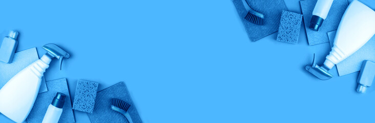Banner made from cleaning products are on blue background.