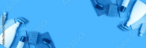 Banner made from cleaning products are on blue background.