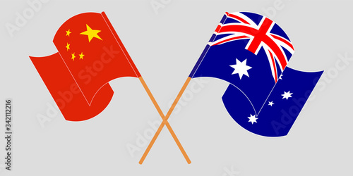 Crossed and waving flags of Australia and China