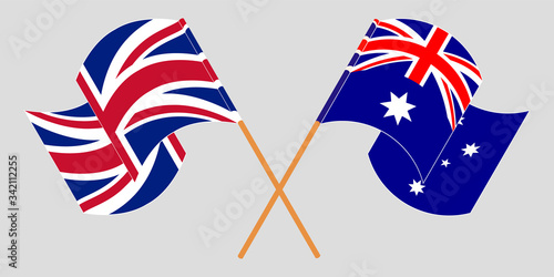 Crossed and waving flags of Australia and the UK