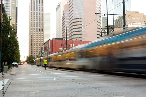 Denver Downtown at Early Morning. Photo Shows Rail Train Running on California Street, Denver Colorado.