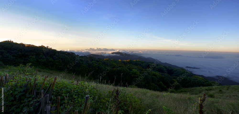 Forested mountain slope in the Kew mae pan nature trail at sunrise, fabulous panorama morning dawn