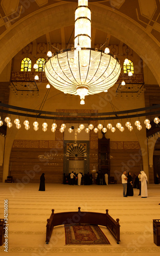 MANAMA, BAHRAIN - JUNE 26: A prayer place and splendid interior of the Al Fateh Grand Mosque on June 26, 2017, Manama, Bahrain. Al Fateh mosque is one of the largest mosque in the world photo